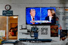 2024 US Presidential Election: Migrants Watch First Debate Harris/Trump In Tijuana, Mexico Shelter