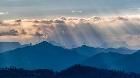 Wind Turbines Spin on A Mountaintop in Chongqing