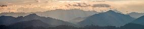 Wind Turbines Spin on A Mountaintop in Chongqing