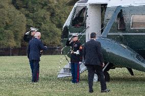 President Joe Biden boards Marine One at Fort Lesley J. McNair