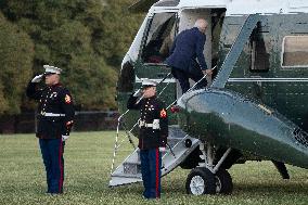 President Joe Biden boards Marine One at Fort Lesley J. McNair