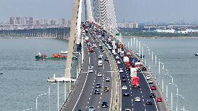 Vehicles Travel on the Shanghai-Suzhou-Nantong Yangtze River Bridge in Suzhou