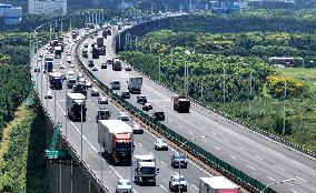 Vehicles Travel on the Shanghai-Suzhou-Nantong Yangtze River Bridge in Suzhou