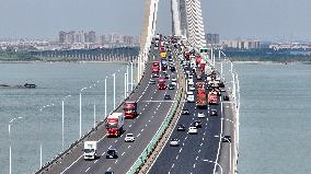 Vehicles Travel on the Shanghai-Suzhou-Nantong Yangtze River Bridge in Suzhou