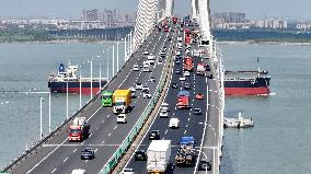 Vehicles Travel on the Shanghai-Suzhou-Nantong Yangtze River Bridge in Suzhou