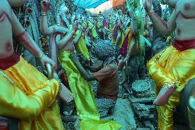 Preparing The Idols Of Vishwokarma Baba In Nepal.