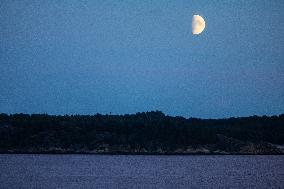 First Quarter Moon In Kristiansand, Norway