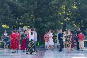 Senior Citizens Dance in A Square in Chongqing