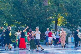 Senior Citizens Dance in A Square in Chongqing