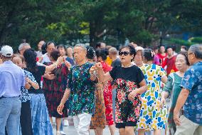 Senior Citizens Dance in A Square in Chongqing