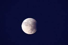 Partial Lunar Eclipse And Supermoon