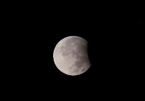 Partial Lunar Eclipse And Supermoon