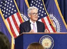 Fed cuts key rate by 0.5 point