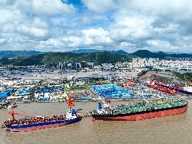 Workers Repair Ships in Zhoushan