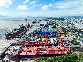 Workers Repair Ships in Zhoushan