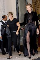 Eva Herzigova leaves her hotel during Milan Fashion Week