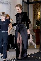 Eva Herzigova leaves her hotel during Milan Fashion Week