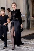 Eva Herzigova leaves her hotel during Milan Fashion Week