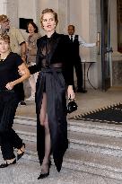 Eva Herzigova leaves her hotel during Milan Fashion Week