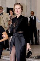 Eva Herzigova leaves her hotel during Milan Fashion Week