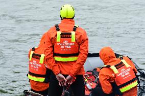 Sea Rescuers On A Boat