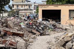 Building Collapse In The Neapolitan Area, People Are Digging Through The Rubble.