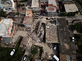 Building Collapse In The Neapolitan Area, People Are Digging Through The Rubble.