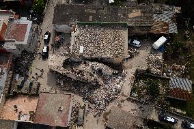 Building Collapse In The Neapolitan Area, People Are Digging Through The Rubble.