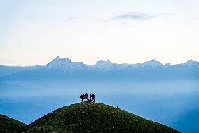 Tourists Are Enjoying The Scenery Of The Mountain Range From Sailung Hill In Dolakha, Nepal