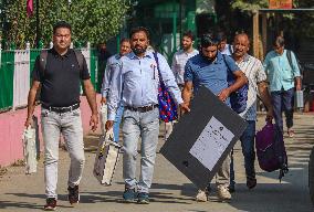 Distribution Of Electronic Voting Machines (EVM) On The Eve Of The Second Phase Of Voting During Assembly Elections In Kashmir