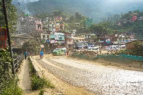 Passengers Suffer From Dust Pollution While Traveling On Prithvi Highway In Dhading.