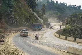 Passengers Suffer From Dust Pollution While Traveling On Prithvi Highway In Dhading.