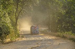 Passengers Suffer From Dust Pollution While Traveling On Prithvi Highway In Dhading.