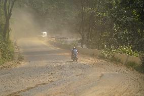 Passengers Suffer From Dust Pollution While Traveling On Prithvi Highway In Dhading.