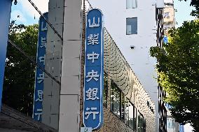 Exterior, logo and signage of The Yamanashi Chuo Bank