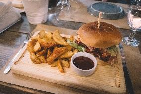 A Burger With French Fries