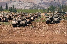 Israel Deploys Tanks Near Lebanon