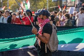 Demonstration In Barcelona During The General Strike For Palestine.