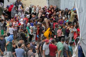 People Get Food Relief In Jabalia Refugee Camp - Gaza