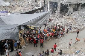 People Get Food Relief In Jabalia Refugee Camp - Gaza