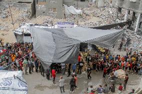 People Get Food Relief In Jabalia Refugee Camp - Gaza