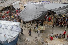 People Get Food Relief In Jabalia Refugee Camp - Gaza