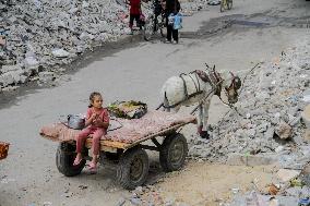 People Get Food Relief In Jabalia Refugee Camp - Gaza