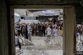 People Get Food Relief In Jabalia Refugee Camp - Gaza