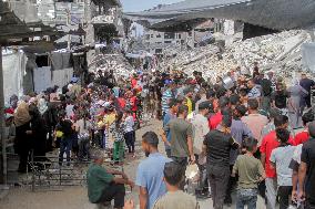 People Get Food Relief In Jabalia Refugee Camp - Gaza