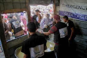 People Get Food Relief In Jabalia Refugee Camp - Gaza