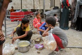 People Get Food Relief In Jabalia Refugee Camp - Gaza