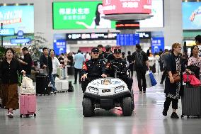 Police officers Serve Tourists During the National Day Holiday in Shenyang