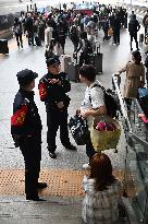 Police officers Serve Tourists During the National Day Holiday in Shenyang