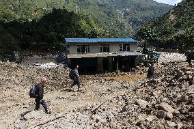 Flood And Landslide Destroys BP Highway In Nepal